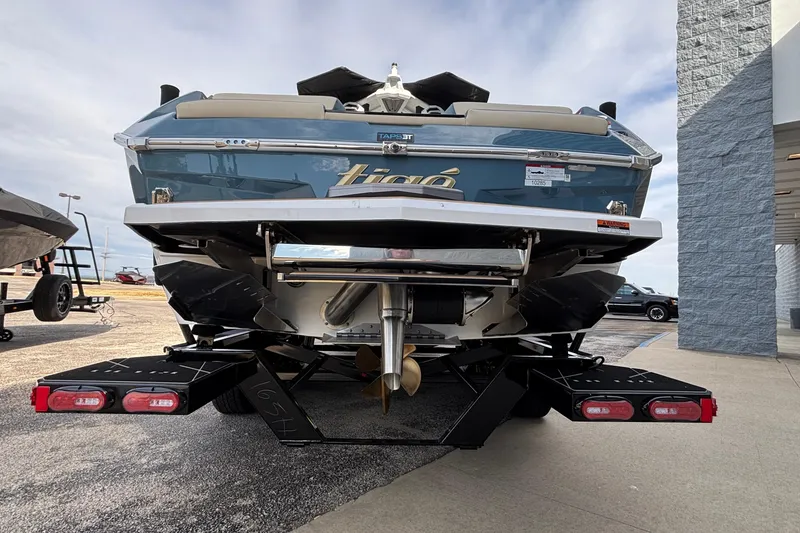 Slide: The Image of 2026 Tigé Ultré 25ZX boat rear view, showcasing sleek design and advanced features. - 69
