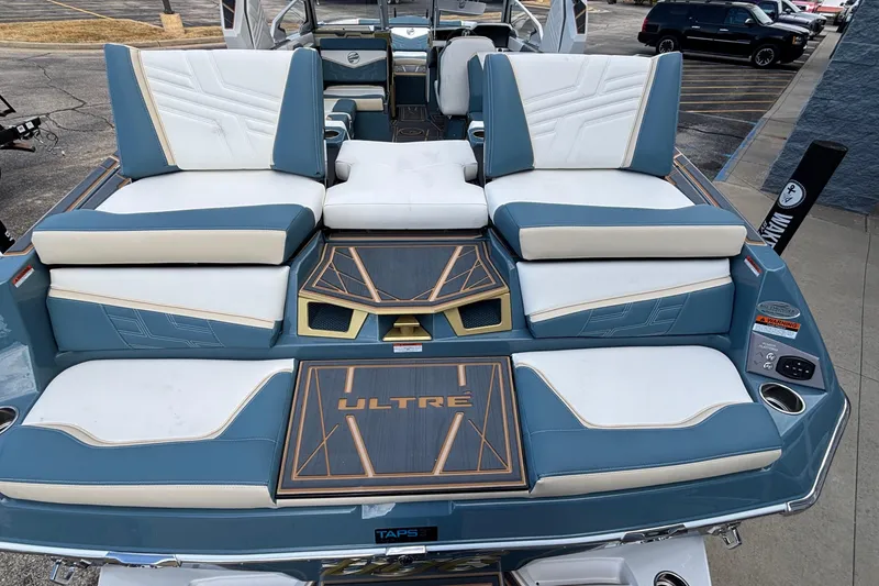 Slide: The Image of 2026 Tigé Ultré 25ZX boat with luxurious seating and modern design. - 7