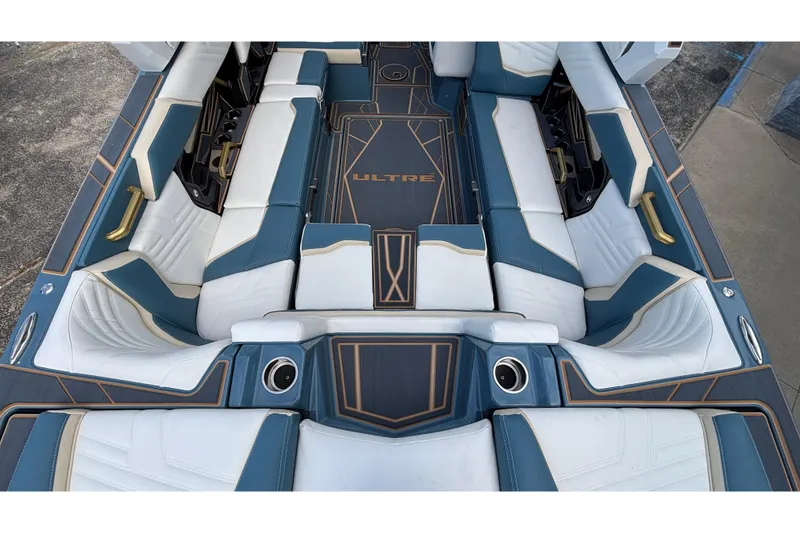 Slide: The Image of 2026 Tigé Ultré 25ZX boat interior with luxurious seating and modern design. - 8