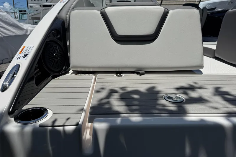 Slide: The Image of 2025 Yamaha Boats AR250 interior with sleek seating and modern design elements. - 31