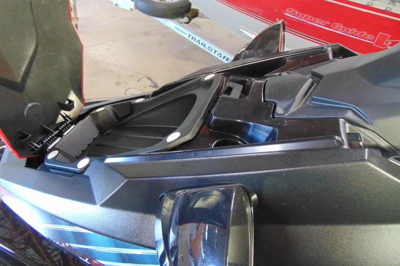 Slide: The Image of 2024 Yamaha WaveRunner EX Sport storage compartment open, showcasing interior design. - 5