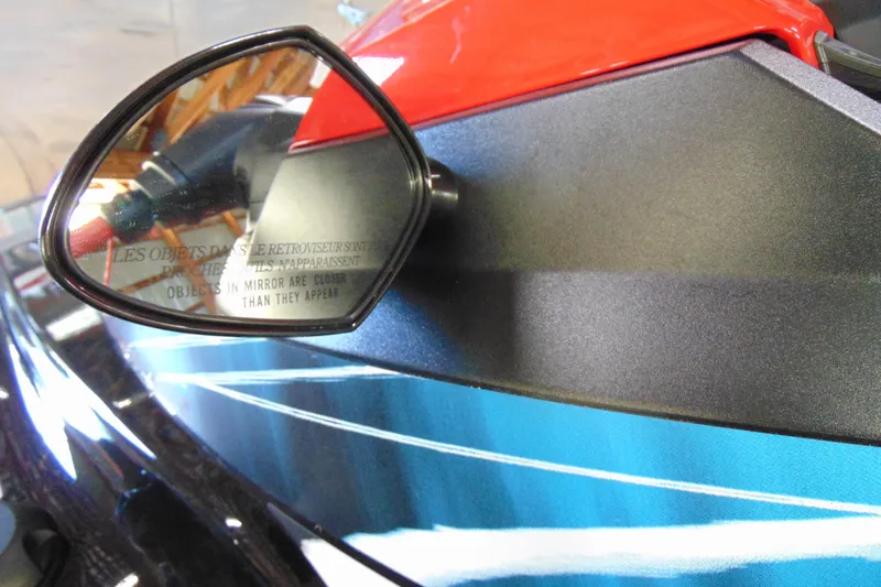 Slide: The Image of 2024 Yamaha WaveRunner EX Sport side mirror with reflection warning text. - 6