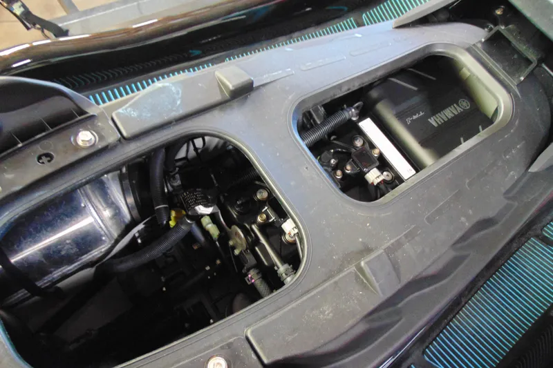 Slide: The Image of 2024 Yamaha WaveRunner EX Sport engine compartment, showcasing internal components and design. - 9