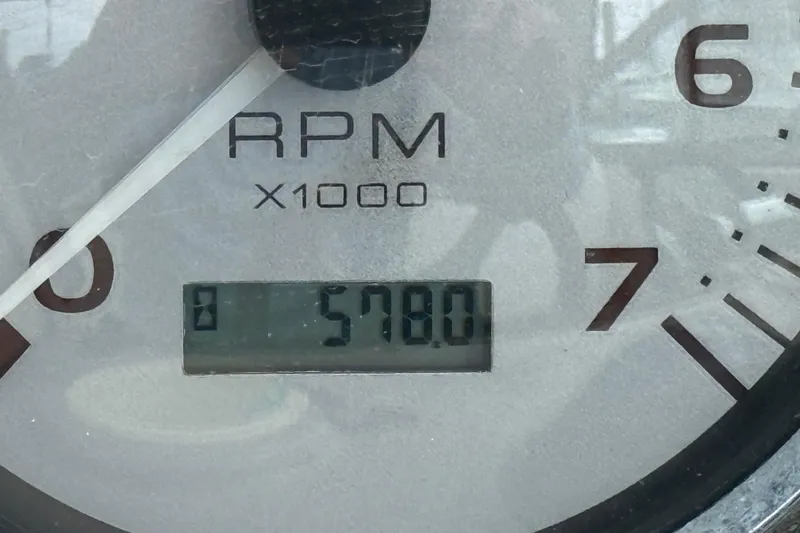 Slide: The Image of Tachometer reading 578 hours on 2004 Rinker 342 boat. - 3