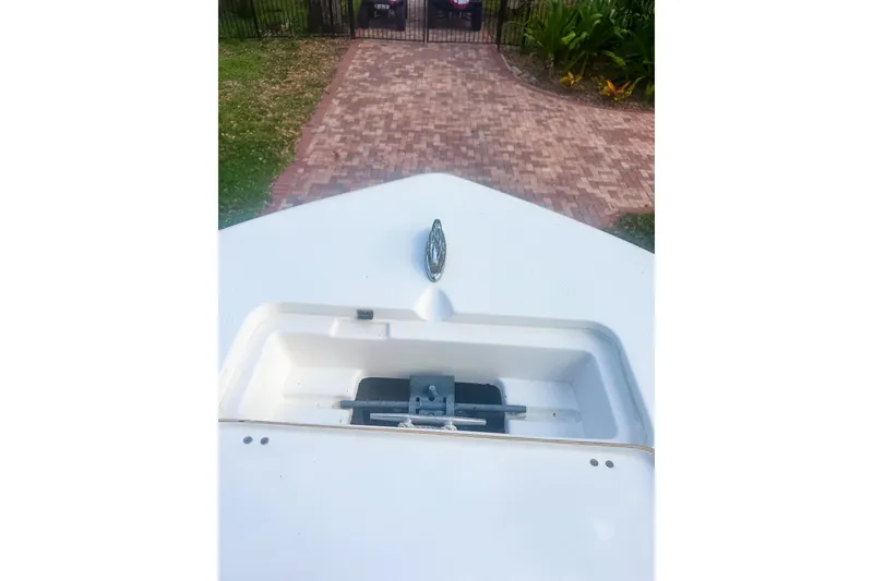 Slide: The Image of Bow view of 2017 Tidewater 230 CC Adventure boat with anchor compartment. - 15