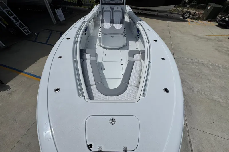 Slide: The Image of 2026 Yellowfin 36 Offshore boat with spacious deck and seating area. - 22