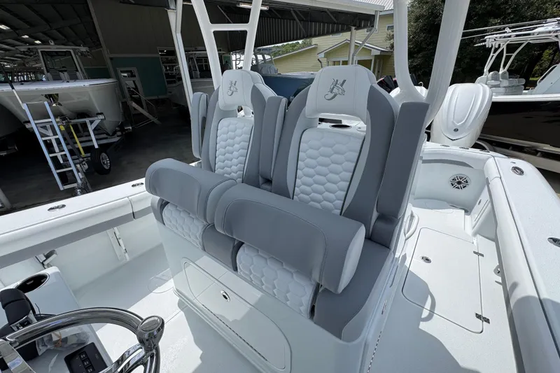 Slide: The Image of 2026 Yellowfin 36 Offshore boat interior with stylish seating and modern design. - 28
