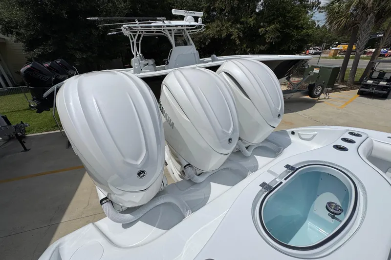 Slide: The Image of 2026 Yellowfin 36 Offshore boat with triple Yamaha outboard engines. - 45