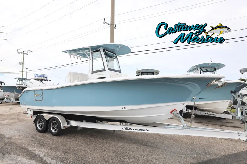 The Image of 2026 Sea Hunt Ultra 265 SE boat on trailer at Castaway Marine dealership. - 0
