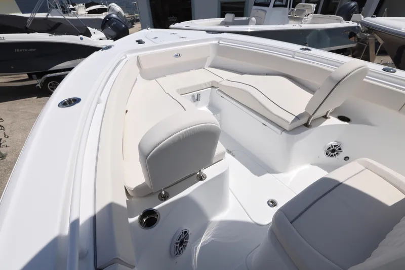 Slide: The Image of 2026 Sea Hunt Ultra 265 SE boat interior with white seating and modern design. - 35