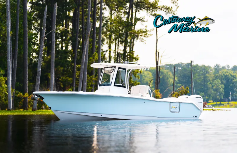 Slide: The Image of Family enjoying a day on a 2025 Sea Hunt Ultra 265 SE boat. - 38