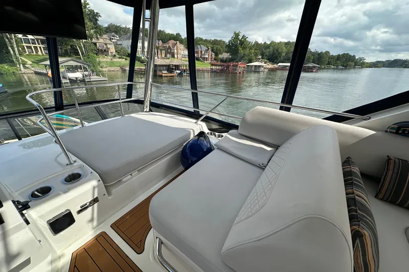 Slide: The Image of Luxurious 2017 Sea Ray Fly 460 yacht interior with scenic lake view. - 16