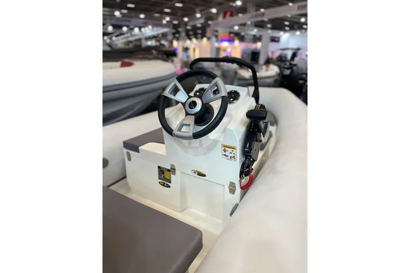 Slide: The Image of Steering console of 2026 Northstar Vega 3.8 boat at a marine exhibition. - 8