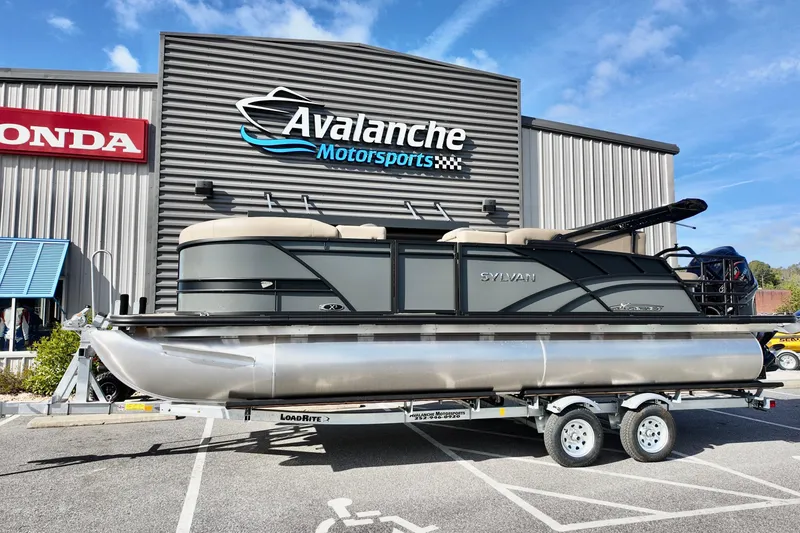 The Image of 2026 Sylvan Mirage X3 CLZ pontoon boat on trailer at Avalanche Motorsports. - 2