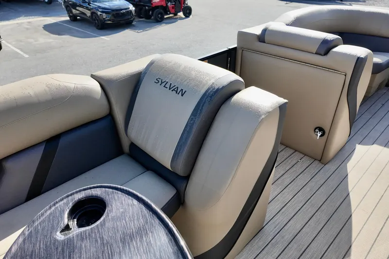 Slide: The Image of Luxurious seating on 2026 Sylvan Mirage X3 CLZ pontoon boat, featuring premium upholstery. - 5