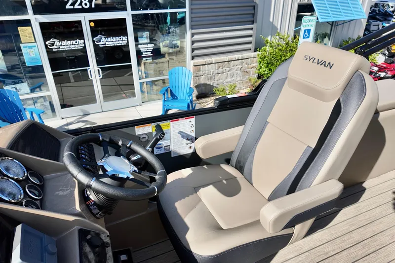 Slide: The Image of Captain's seat and steering wheel of 2026 Sylvan Mirage X3 CLZ boat. - 7