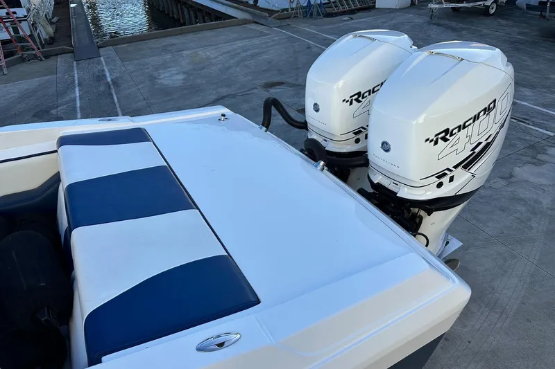 Slide: The Image of 2017 Formula 292 SR-1 boat with twin Racing 400 outboard engines at dock. - 13