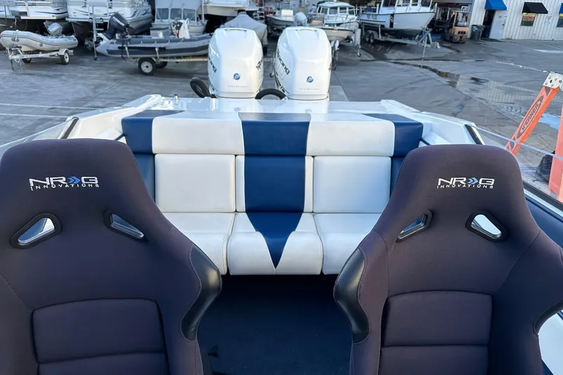 Slide: The Image of 2017 Formula 292 SR-1 boat interior with NRG Innovations seats and dual engines. - 23