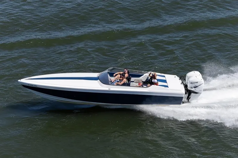 Slide: The Image of 2017 Formula 292 SR-1 speedboat cruising on open water, showcasing sleek design and performance. - 31