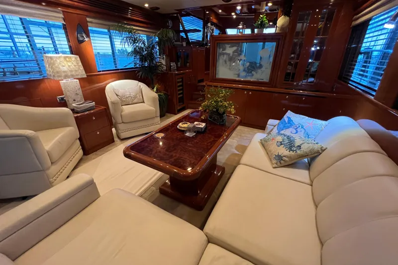 Slide: The Image of Luxurious interior of a 2012 Hampton motor yacht with elegant seating and decor. - 15