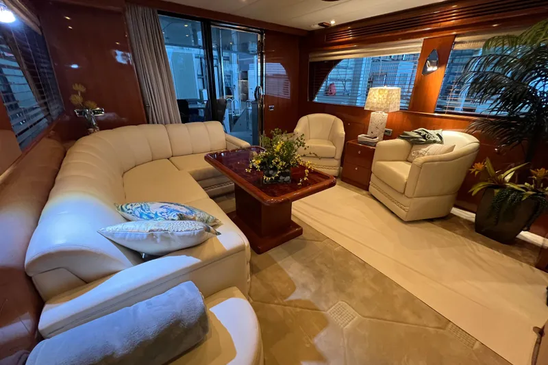 Slide: The Image of Luxurious 2012 Hampton motor yacht interior with elegant seating and decor. - 9