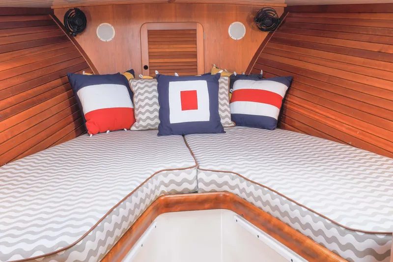 Slide: The Image of Interior of 1999 Hinckley Picnic Boat 36 Classic, featuring elegant wooden cabinetry and sink. - 10