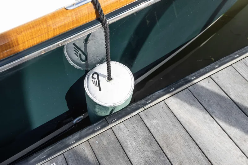Slide: The Image of Elegant setup on 1999 Hinckley Picnic Boat 36 Classic with champagne and flowers. - 15