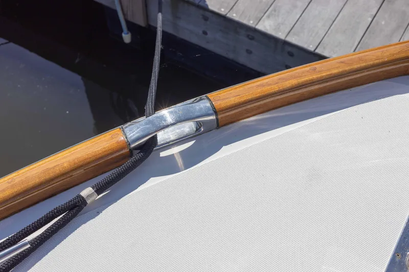 Slide: The Image of Engine compartment of a 1999 Hinckley Picnic Boat 36 Classic, showcasing Yanmar diesel engine. - 21