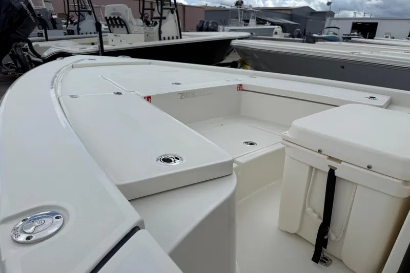 Slide: The Image of 2026 Pathfinder 2300 HPS boat interior with seating and storage compartments. - 7