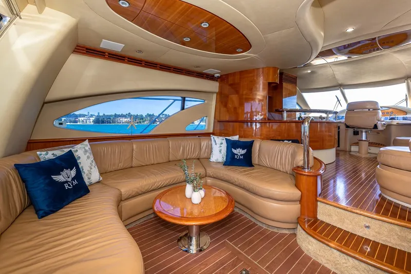 Slide: The Image of Luxurious interior of 2007 Azimut Fly 62 yacht with elegant seating and wooden finishes. - 12