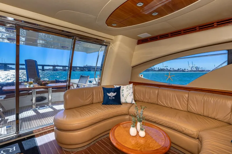 Slide: The Image of Luxurious interior of 2007 Azimut Fly 62 yacht with ocean view and leather seating. - 13