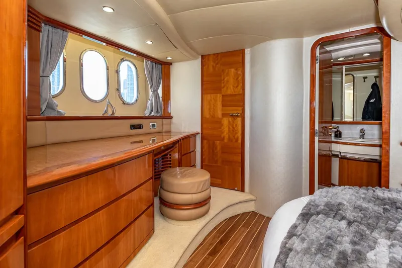 Slide: The Image of Luxurious interior of 2007 Azimut Fly 62 yacht with elegant wood finishes. - 21
