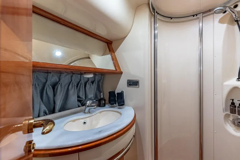 Slide: The Image of Luxurious bathroom interior of 2007 Azimut Fly 62 yacht with elegant fixtures. - 28