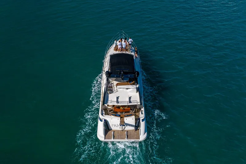Slide: The Image of Aerial view of 2007 Azimut Fly 62 yacht cruising on open water. - 6