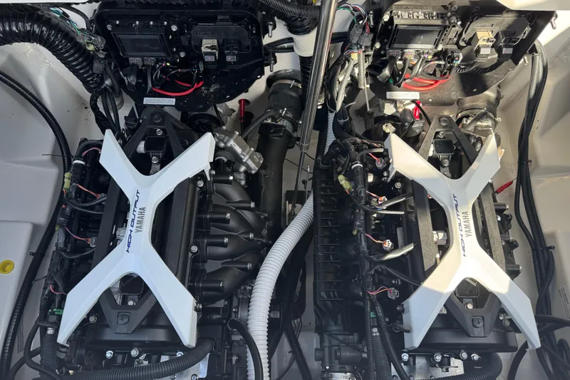 Slide: The Image of 2025 Yamaha Boats AR250 engine compartment showcasing dual high-output engines. - 24