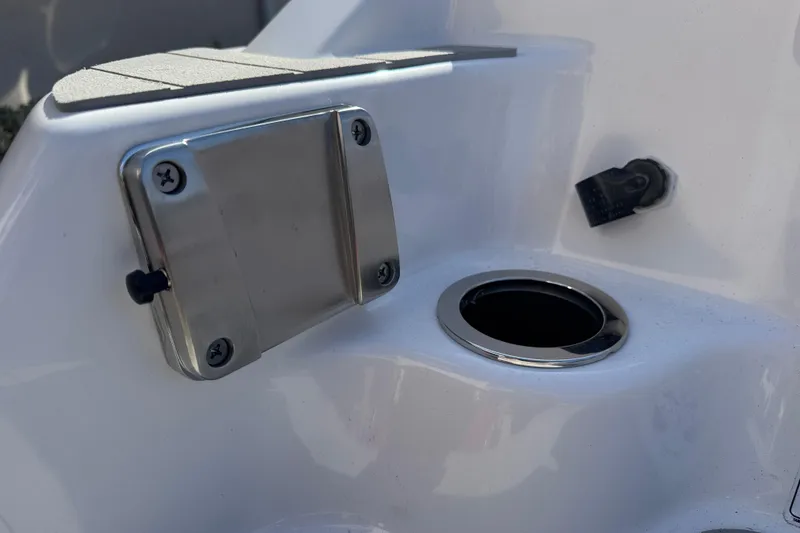 Slide: The Image of 2025 Yamaha Boats AR250 stainless steel fixture and cup holder detail. - 27