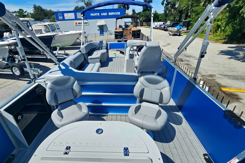 Slide: The Image of 2026 Bentley Pontoons 203 Fish-N-Cruise boat with spacious seating and modern design. - 16