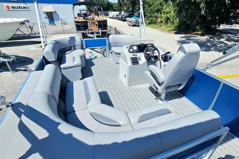Slide: The Image of 2026 Bentley Pontoons 203 Fish-N-Cruise with spacious seating and modern helm. - 17