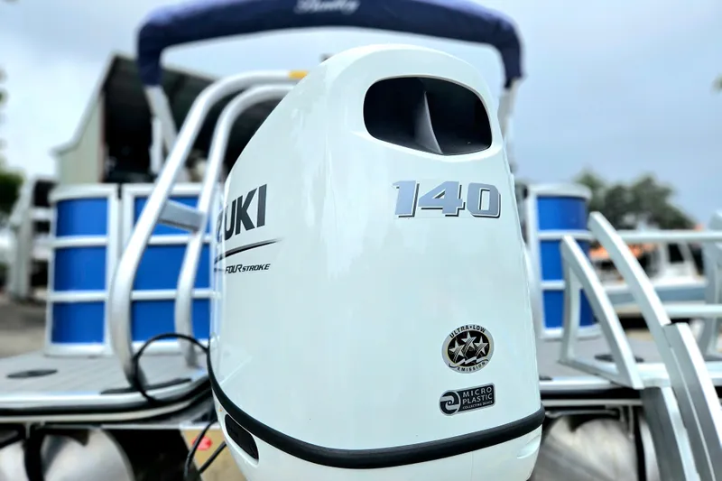 Slide: The Image of 2026 Bentley Pontoons 203 Fish-N-Cruise with Suzuki 140 outboard motor, showcasing sleek design. - 4