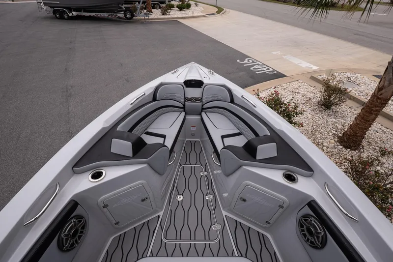 Slide: The Image of 2024 Sunsation 32 CCX boat interior with sleek seating and modern design. - 16