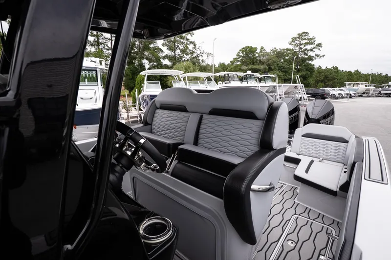 Slide: The Image of 2024 Sunsation 32 CCX boat interior with luxurious seating and modern design. - 18