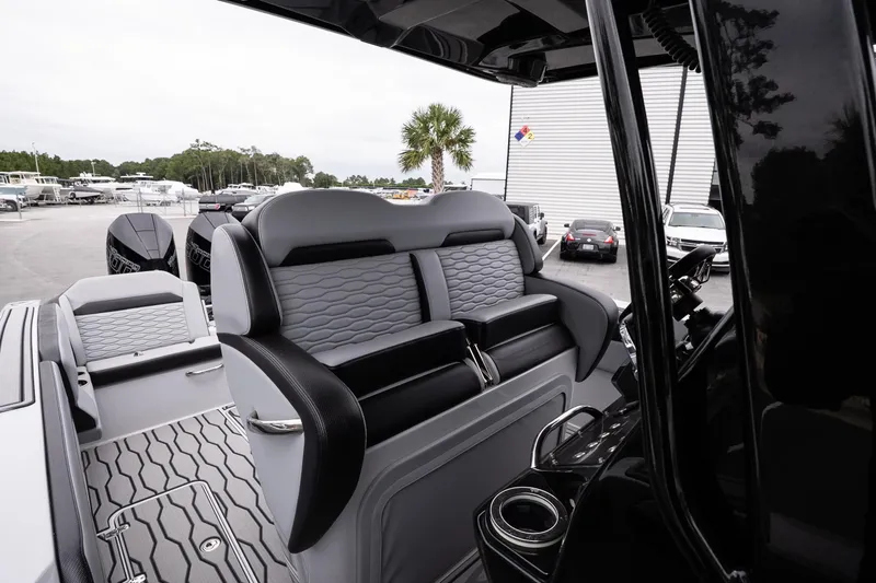 Slide: The Image of 2024 Sunsation 32 CCX boat interior with luxurious seating and modern design. - 19