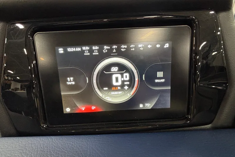 Slide: The Image of ATX Surf Boats 2026 24 Type-S dashboard display showing speed and settings. - 11