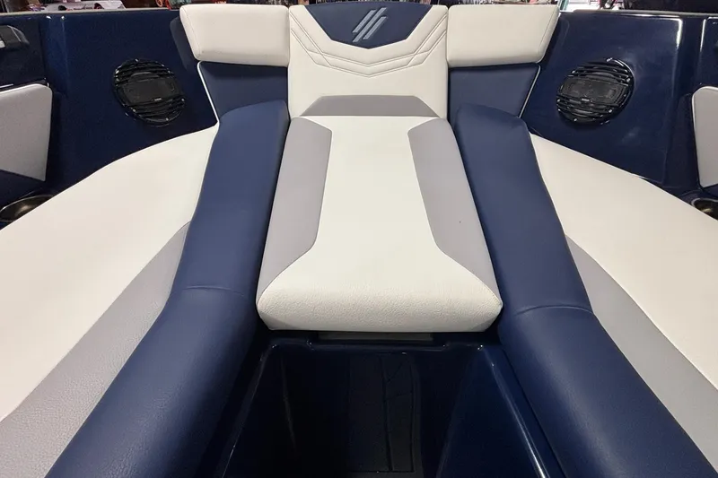 Slide: The Image of Interior seating of 2026 ATX Surf Boats 24 Type-S, featuring blue and white upholstery. - 14