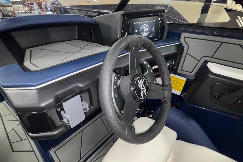 Slide: The Image of Interior view of 2026 ATX Surf Boats 24 Type-S dashboard and steering wheel. - 22