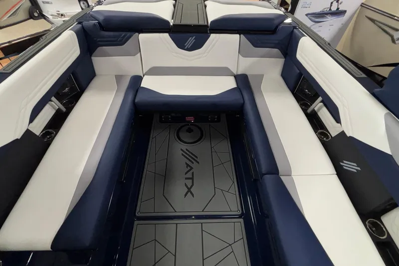 Slide: The Image of 2026 ATX Surf Boats 24 Type-S interior with blue and white seating. - 33