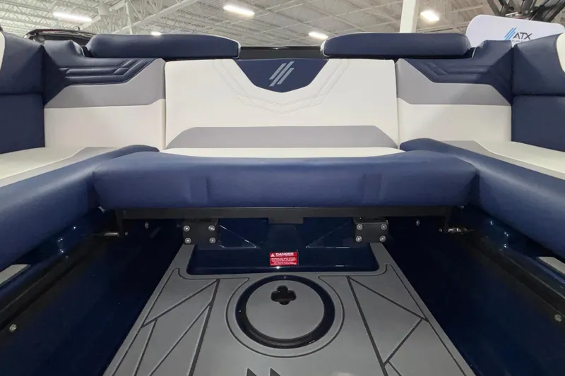 Slide: The Image of Interior seating of 2026 ATX Surf Boats 24 Type-S, featuring blue and white upholstery. - 35
