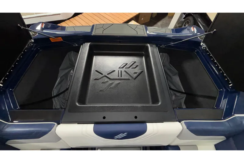 Slide: The Image of 2026 ATX Surf Boats 24 Type-S interior storage compartment, featuring sleek design and branding. - 44