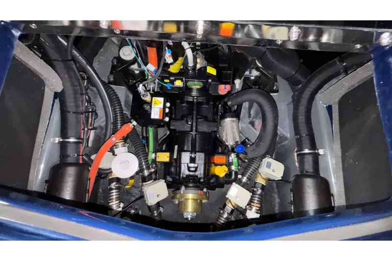 Slide: The Image of Engine compartment of 2026 ATX Surf Boats 24 Type-S, showcasing intricate mechanical components. - 46