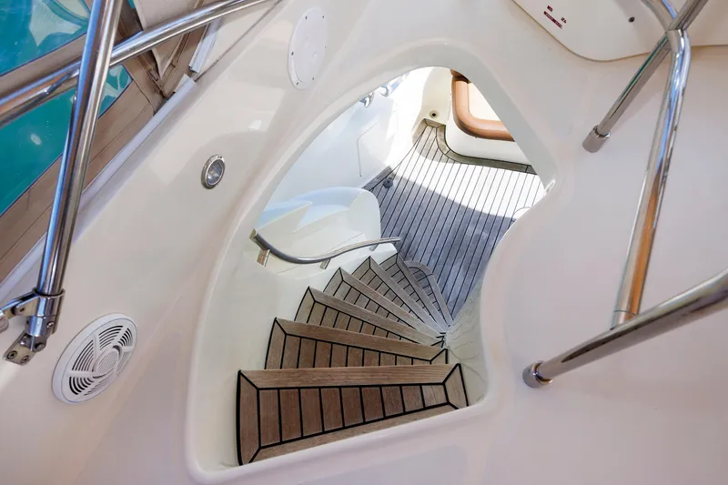 Slide: The Image of Staircase on 2005 Aicon Yachts 56 Flybridge with sleek design and wooden steps. - 28